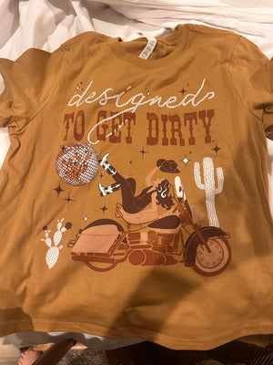 Brown t-shirt with western graphic design and text 'designed to get dirty' on it
