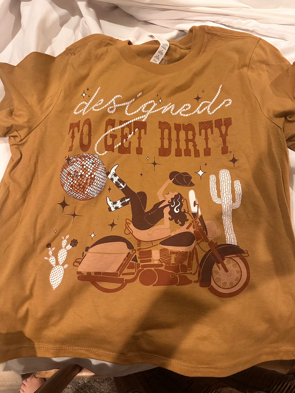 Brown t-shirt with western graphic design and text 'designed to get dirty' on it
