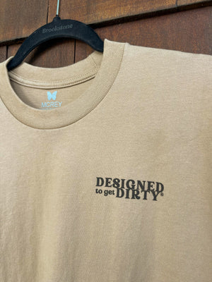 Sand-colored unisex shirt with Designed to get Dirty® printed on the front left chest