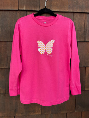 Hot pink youth long sleeve with an orange and pink checkered butterfly on the front, surrounded by little daisies