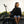 Cargar imagen en el visor de la galería, young girl sitting at a BMX park next to her bike, wearing a black hoodie with the words &#39;Designed to get dirty&#39; on the front
