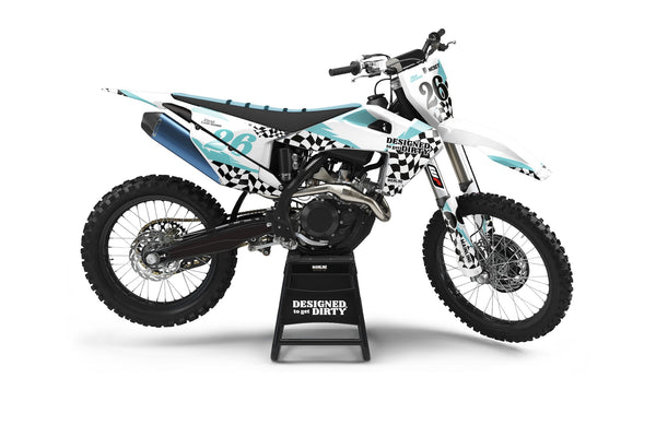 Custom dirt bike graphics kit with black and white checkers and turquoise accents