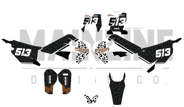 Black leopard dirt bike graphics kit with bronze accents.