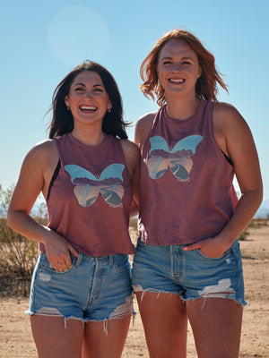 mauve racerback tank with a butterfly and desert road landscape on the front