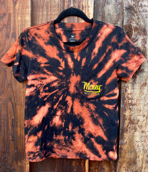 Women's tie-dyed black tee. On the back is MCREY MOTOCROSS CO logo on a small pocket.