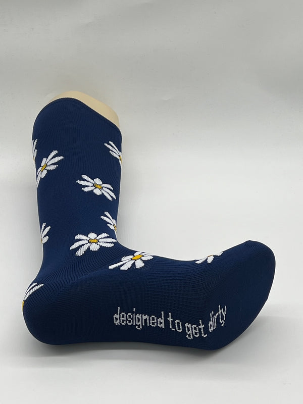 Women's knee-high performance moto socks in navy blue with white daisies